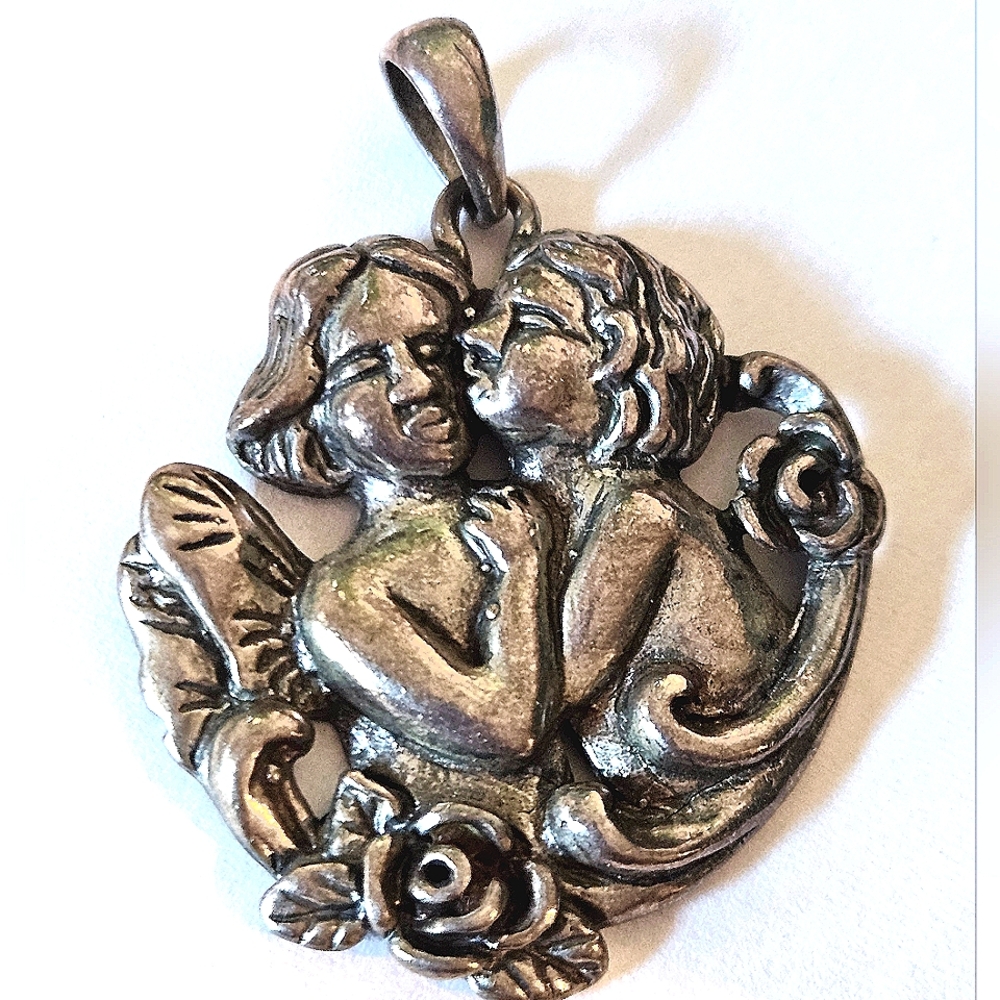 Vintage Art Nouveau Sterling Kissing Cupid Pendant